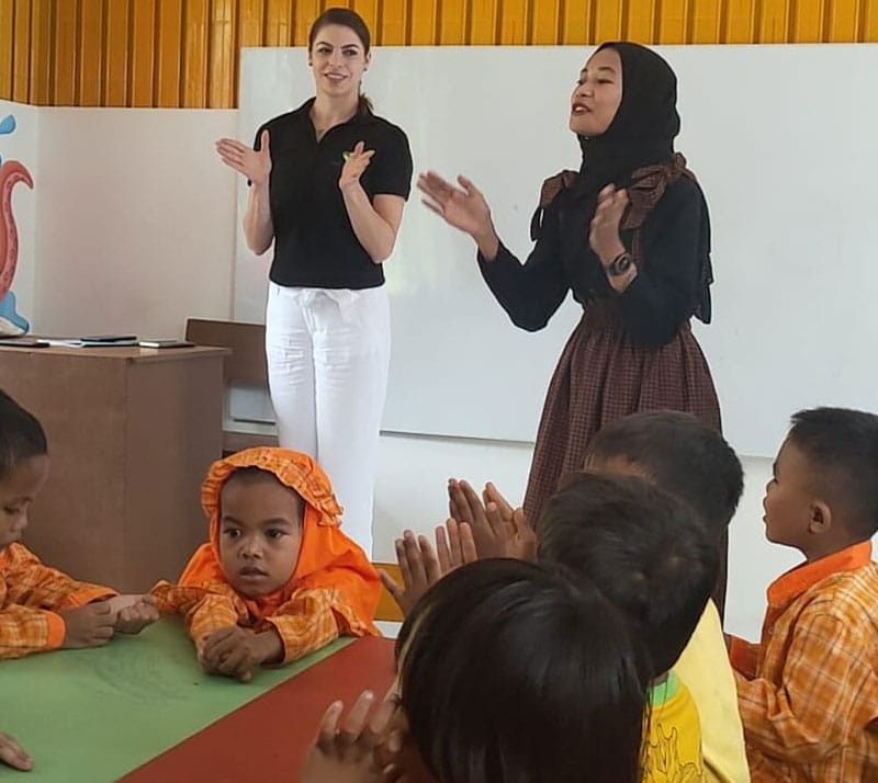 Teacher Mulyani teach the kids